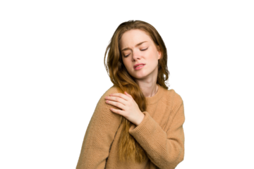 Young caucasian redhead woman isolated having a shoulder pain.
