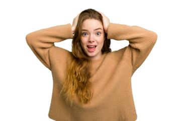Young caucasian redhead woman isolated screaming, very excited, passionate, satisfied with something.