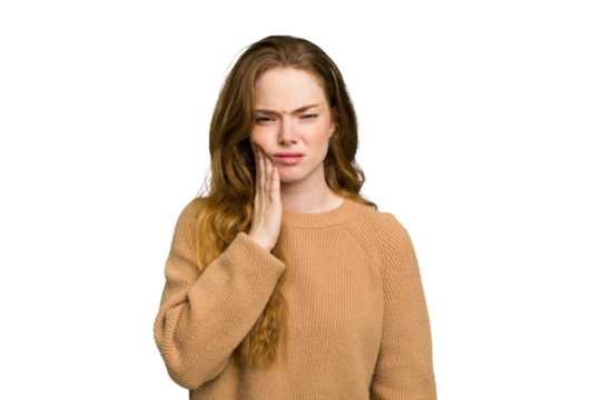 Young caucasian redhead woman isolated having a strong teeth pain, molar ache.