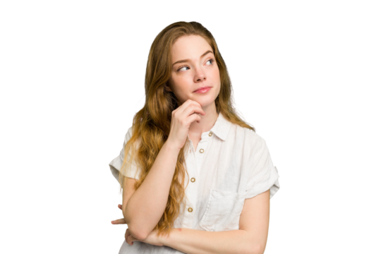 Young caucasian redhead woman isolated relaxed thinking about something looking at a copy space. - Powered by Adobe