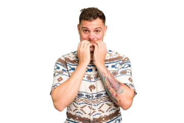 Young caucasian handsome man isolated biting fingernails, nervous and very anxious.