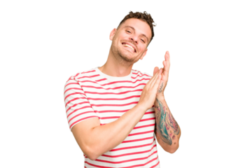 Young caucasian handsome man isolated feeling energetic and comfortable, rubbing hands confident.