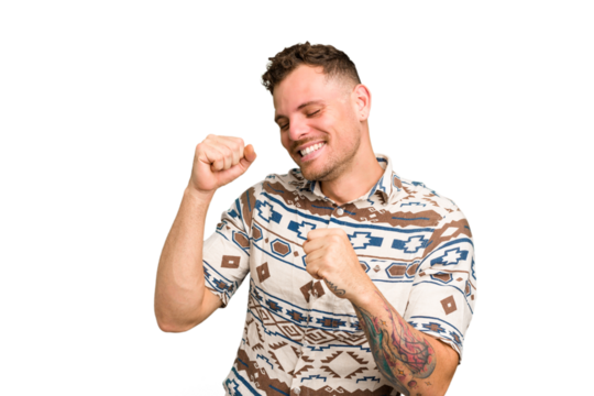Young caucasian handsome man isolated dancing and having fun.