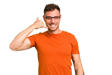 Fototapeta premium Young caucasian handsome man isolated showing a mobile phone call gesture with fingers.