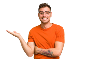 Young caucasian handsome man isolated showing a copy space on a palm and holding another hand on waist.