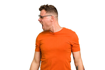 Obraz premium Young caucasian handsome man isolated shouting very angry, rage concept, frustrated.