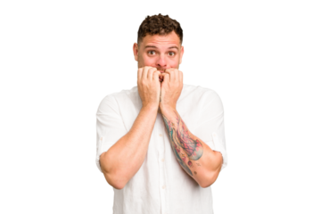 Young caucasian handsome man isolated biting fingernails, nervous and very anxious.