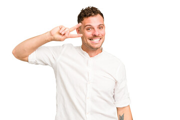 Young caucasian handsome man isolated dancing and having fun.