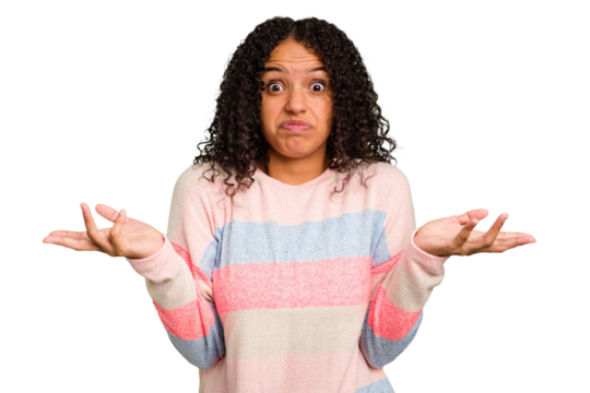 Young Brazilian curly hair cute woman isolated doubting and shrugging shoulders in questioning gesture.