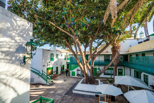 Picturesque white and green settlement called Pueblo Marinero designed by Cesar Manrique located in Costa Teguise, Lanzarote, Canary Island