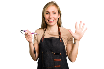 Young caucasian manicurist woman holding an electric file drill isolated smiling cheerful showing number five with fingers.