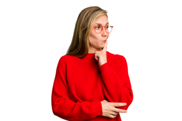 Young caucasian woman cutout isolated looking sideways with doubtful and skeptical expression.