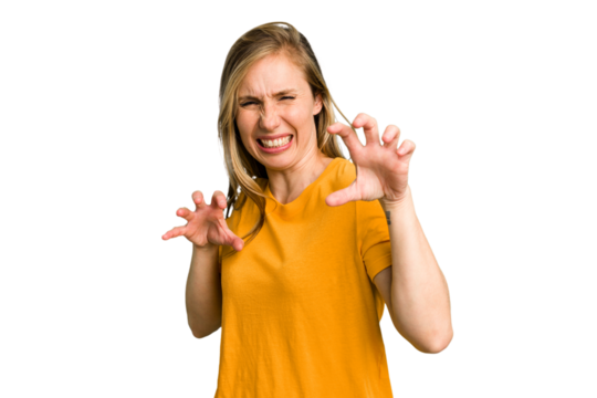 Young caucasian woman cutout isolated showing claws imitating a cat, aggressive gesture.