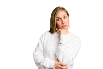 Young caucasian woman cutout isolated confused, feels doubtful and unsure.