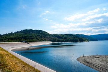 View of the Grane reservoir with the surrounding nature near Goslar. Landscape at the Granetalsperre in the Harz Mountains.
