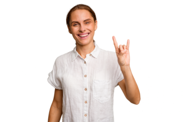 Young caucasian woman isolated showing a horns gesture as a revolution concept.