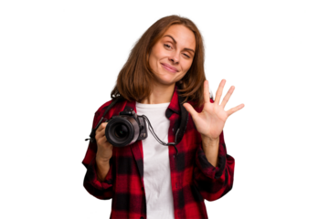 Young photographer caucasian woman isolated smiling cheerful showing number five with fingers.