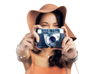 PNG studio shot of a beautiful young woman holding a camera while standing.