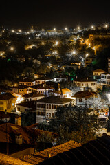 Fototapeta premium Traditional Ottoman Houses in Safranbolu. Safranbolu UNESCO World Heritage Site. Safranbolu night view. Old wooden mansions turkish architecture. Safranbolu night landscape view.