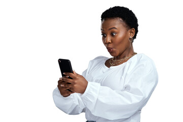 PNG shot of a young woman using her cellphone while standing.