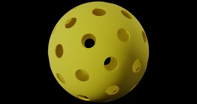 Rotation of a yellow ball with pickleball holes. Close-up png transparent 3d rendering.