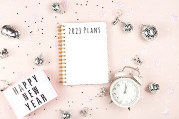 2023 year goals. A notepad with New Year resolutions and holiday decor. Plan, journal, to-do list....