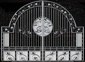 Expensive beautiful metal wrought iron gates.