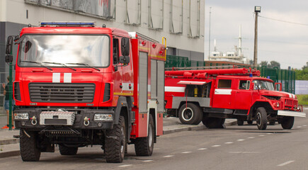 A brigade of firefighters deploys equipment for tasks