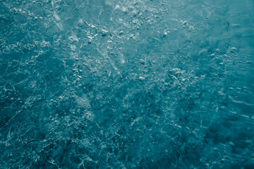 Abstract background of ice texture from ice cave in winter Iceland