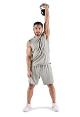 PNG studio portrait of a muscular young man exercising with a kettlebell.