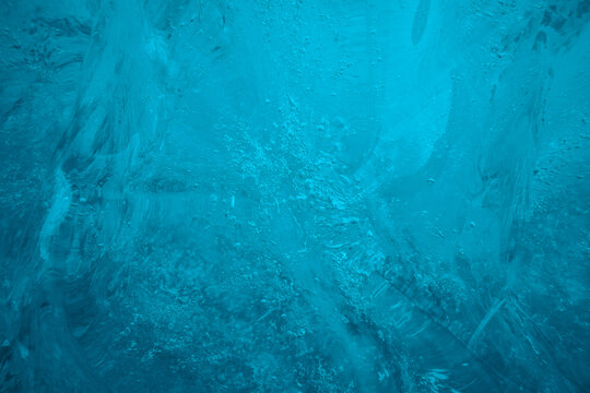 Abstract background of ice texture from ice cave in winter Iceland