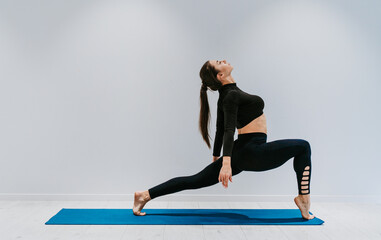 Beautiful girl training in the gym.