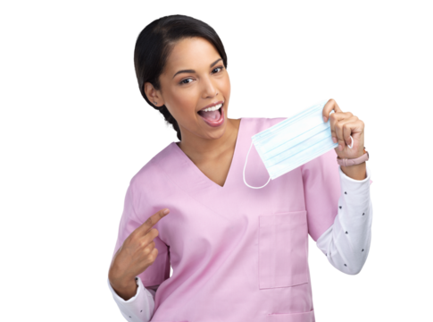 PNG cropped portrait of an attractive young female healthcare worker holding up and pointing to a mask in studio.