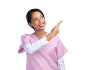 PNG cropped shot of an attractive young female healthcare worker pointing towards copyspace in studio.