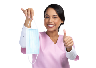 PNG cropped portrait of an attractive young female healthcare worker holding up a mask and gesturing thumbs up in studio.