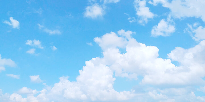 Light blue sky and white clouds. On a clear sky, floating clouds.