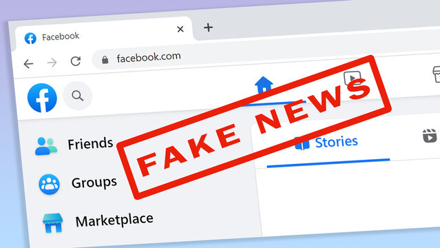 Dresden, Germany - November 29, 2022: Original main Facebook website in a browser, with Facebook blue brand name and a red stamp saying Fake News