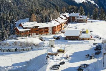 Snow-covered village - San Simone ski resort, Bergamo Alps, Italy