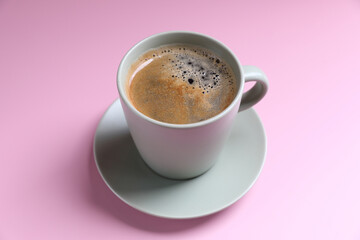 Black coffee white cup isolated on pink background