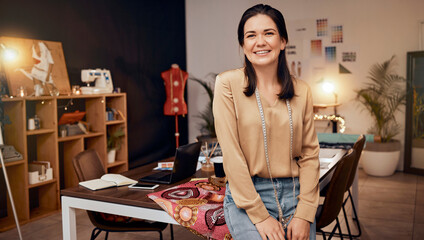 Portrait, fashion and designer in workspace, woman and with smile. Young female, tailor and...
