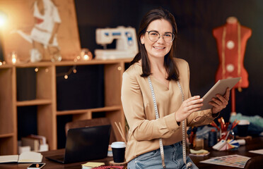 Portrait, woman or fashion designer with tablet for social media, business promotion or smile in...
