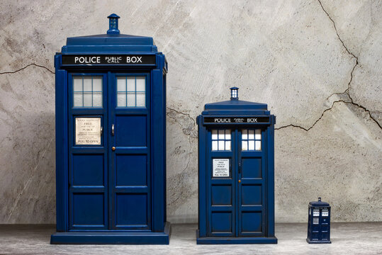 Bologna - Italy - December 1, 2022: Police call box. Tardis from Doctor Who in three different size scales