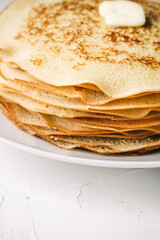 homemade russische crepes on blue english plate