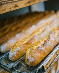 loaves of bread stacked in the bakery