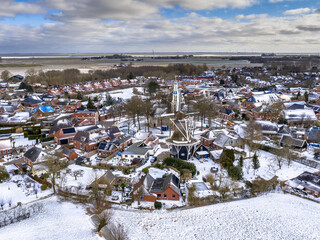 Aerial View over Village of Spijk in Winter
