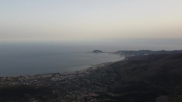Religious statue of Gaeta in Italy, aerial drone fly backward view