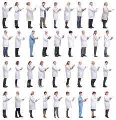 Obraz premium full length group of doctors with notepad isolated