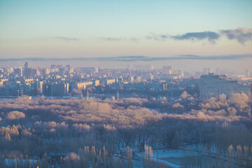 Winter frosty morning - view from the window the city of Samara