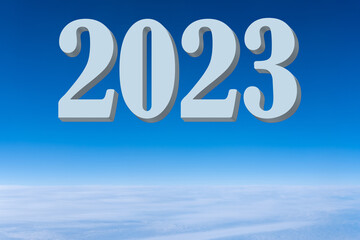 Calendar 2023. The volumetric date of the New Year 2023 on the background of Bright blue sky gradient background