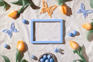 Easter background. Decorated background with blackboard. Empty frame with copy-space, place for...